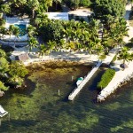 Aerial View - Atlantic Bay Resort Beautiful Beach Front Tropical Area. Book with us DIRECTLY at 1-866-937-5650 and SAVE Tavernier. FL 33070