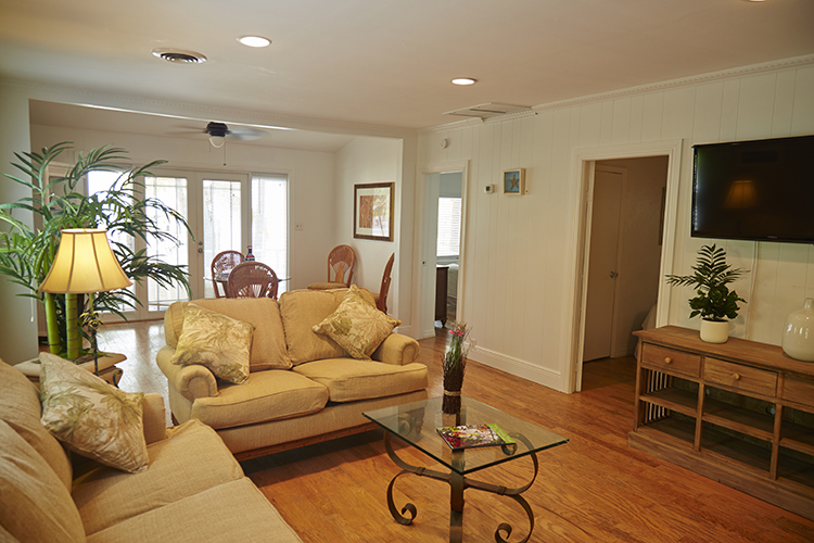 Atlantic Bay Resort Beautiful Beach Front Tropical Area Living room. Book with us DIRECTLY at 1-866-937-5650 and SAVE Tavernier. FL 33070